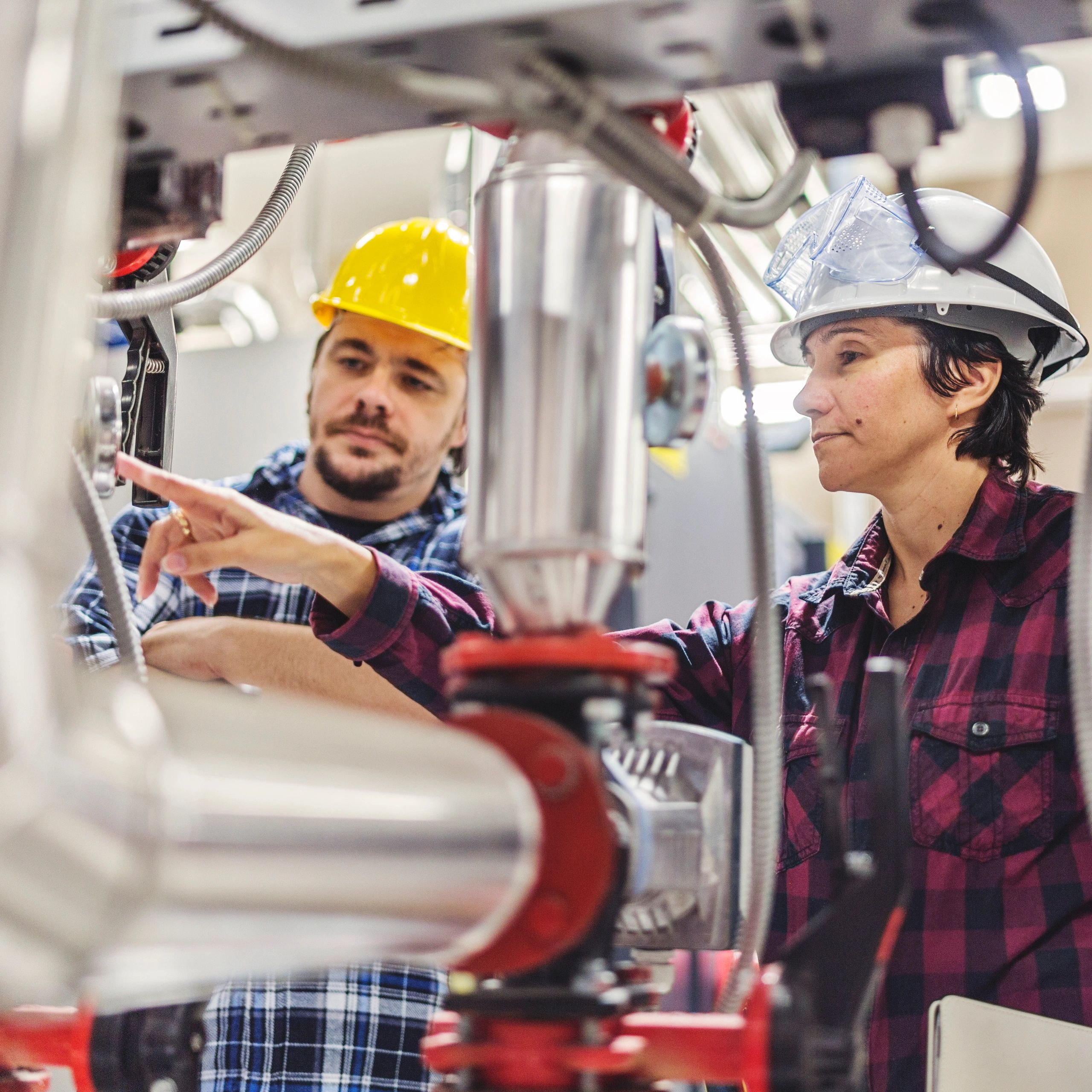 Field technicians working on industrial equipment